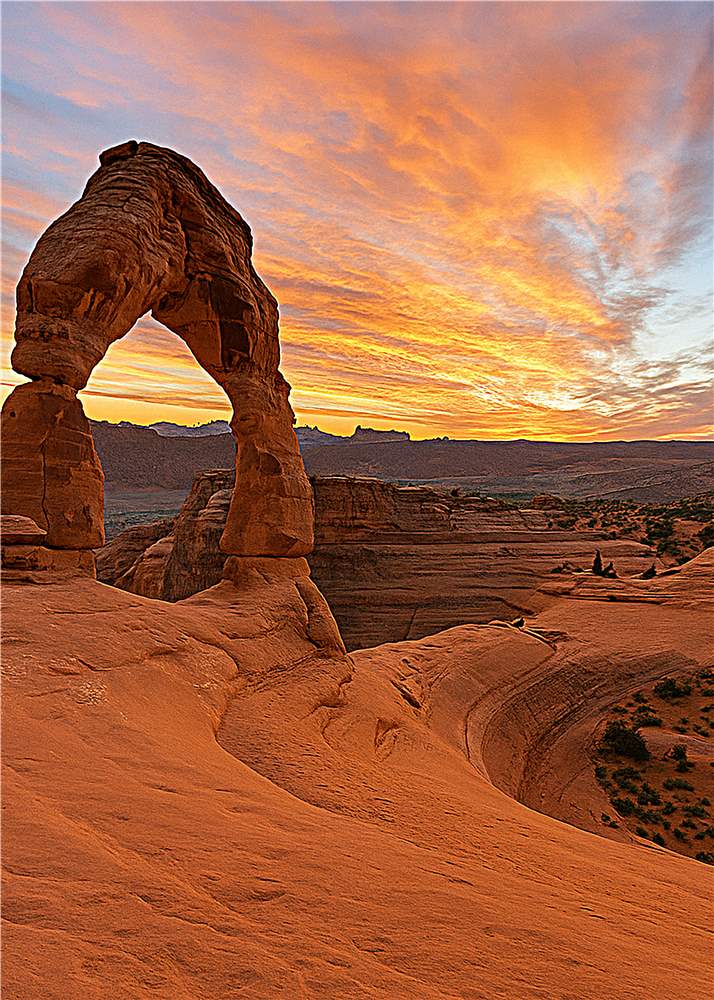 Magisk solnedgang over Delicate Arch plakat