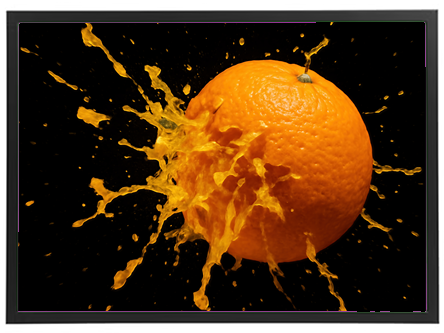 Et billede af en appelsin, der sprøjter juice ud i en dramatisk bevægelse.