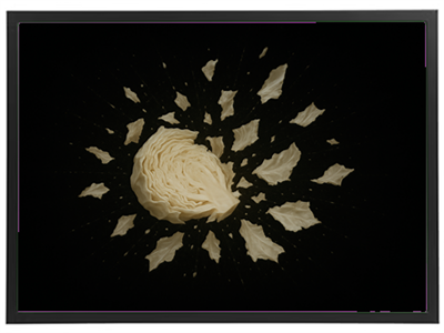 Et kunstnerisk billede af en kålform, der ser ud til at eksplodere i lag.