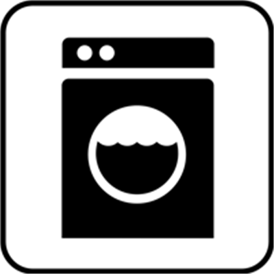 Et ikon af en vaskemaskine med en rund åbning og bølger, der symboliserer vand.