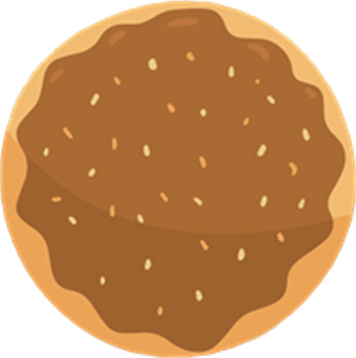 En rund småkage med en gyldenbrun overflade og nødder på toppen.