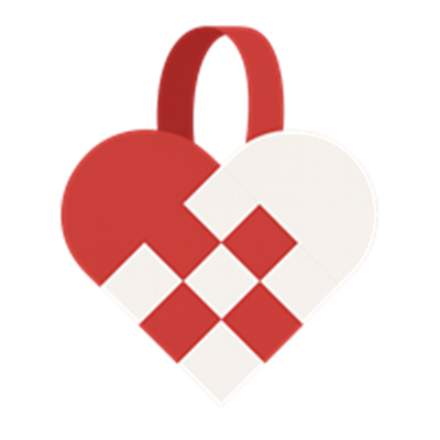 En hjerteformet gaveæske i rød og hvid med et dekorativt design.