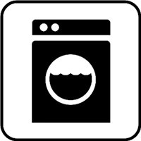 Et simpelt sort-hvidt ikon af en vaskemaskine med en rund åbning.