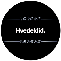 Billedet viser teksten Hvedeklid på en sort baggrund, indrammet af dekorative elementer.